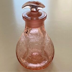 Vintage pink crazed depression glass perfume bottle. Antique decanter